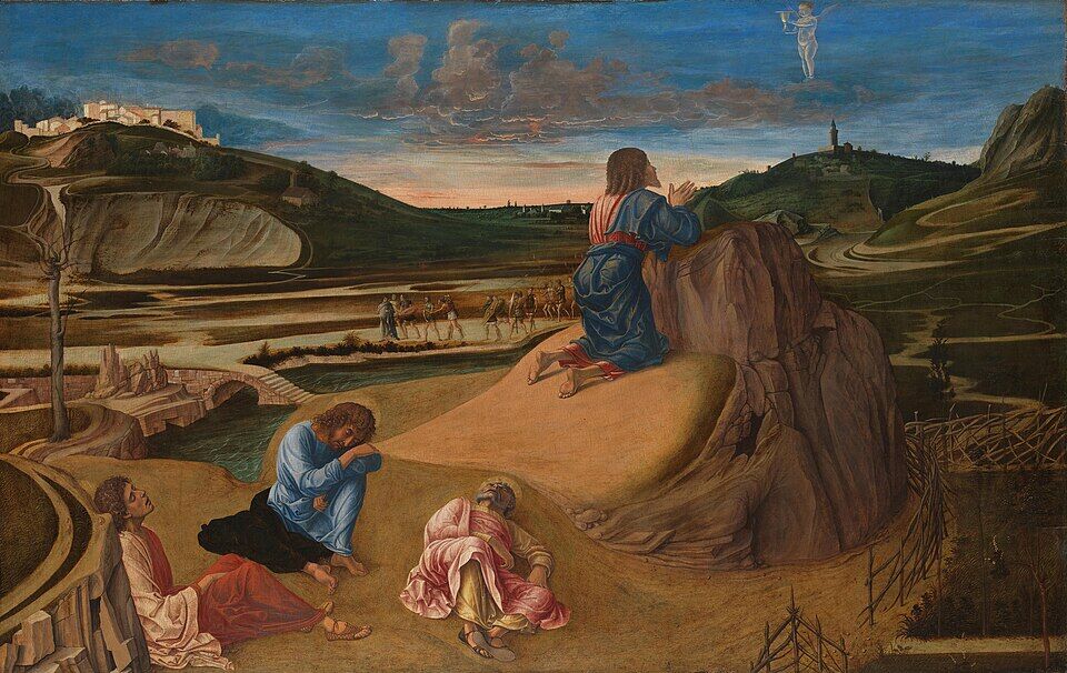Giovanni Bellini, "The Agony in the Garden" (c. 1465). Christ prays upon a rock at the hour of dawn, an angel appears in the sky bearing a cup; below, three disciples sleep, while in the distance Judas already leads the guard across the bridge. All of Gethsemane in a single frame: the cup, the sleep of those closest, the approaching betrayal.